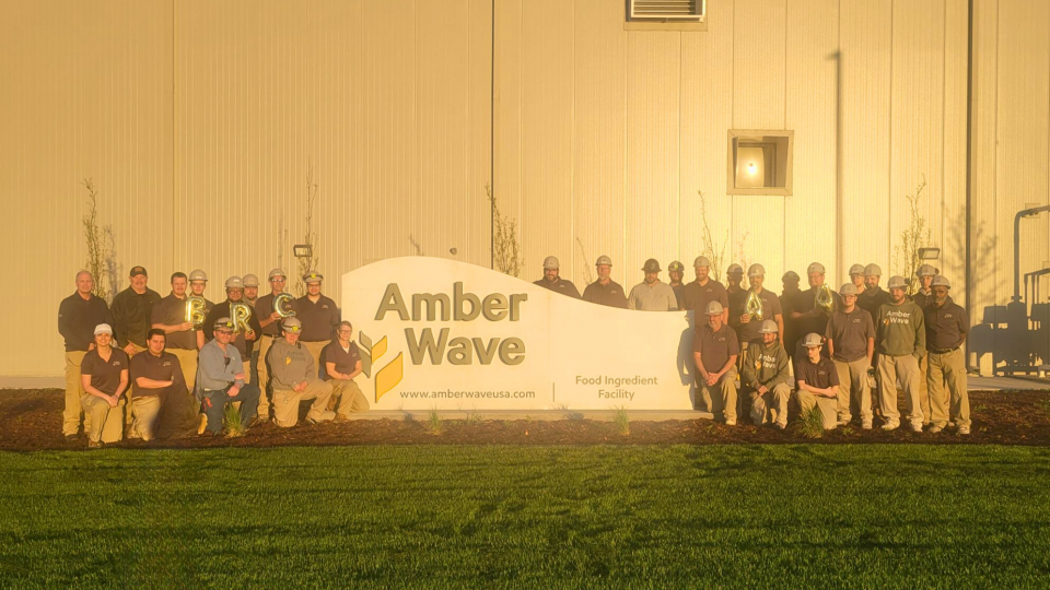 Amber Wave employees pose for BRC rating announcement photo